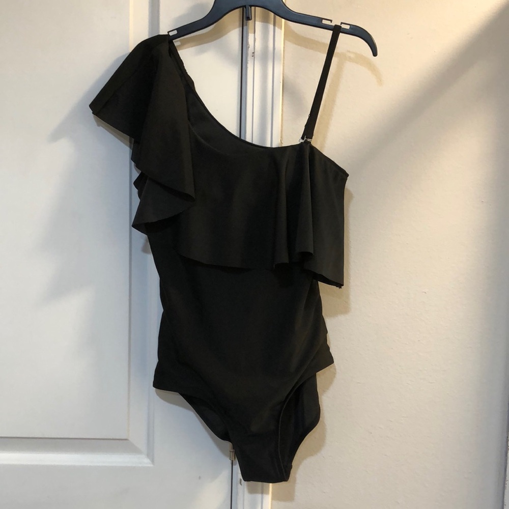 Woman’s black one piece bathing suit. Size medium.